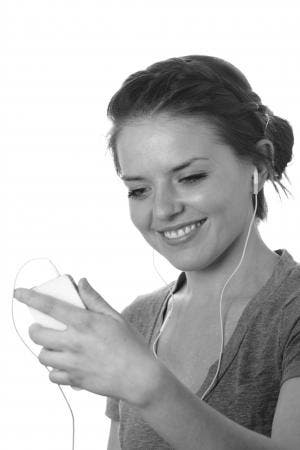 Girl using Apple earphones